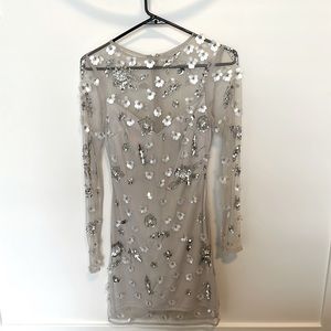 Mini dress (mid thigh) with long sleeve. Sequence